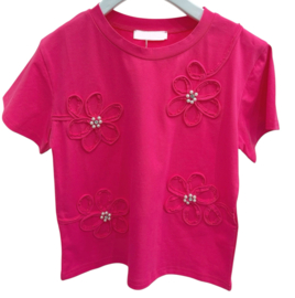 Mooi uitgewerkt shirtje met bloemen in het fuchsia .