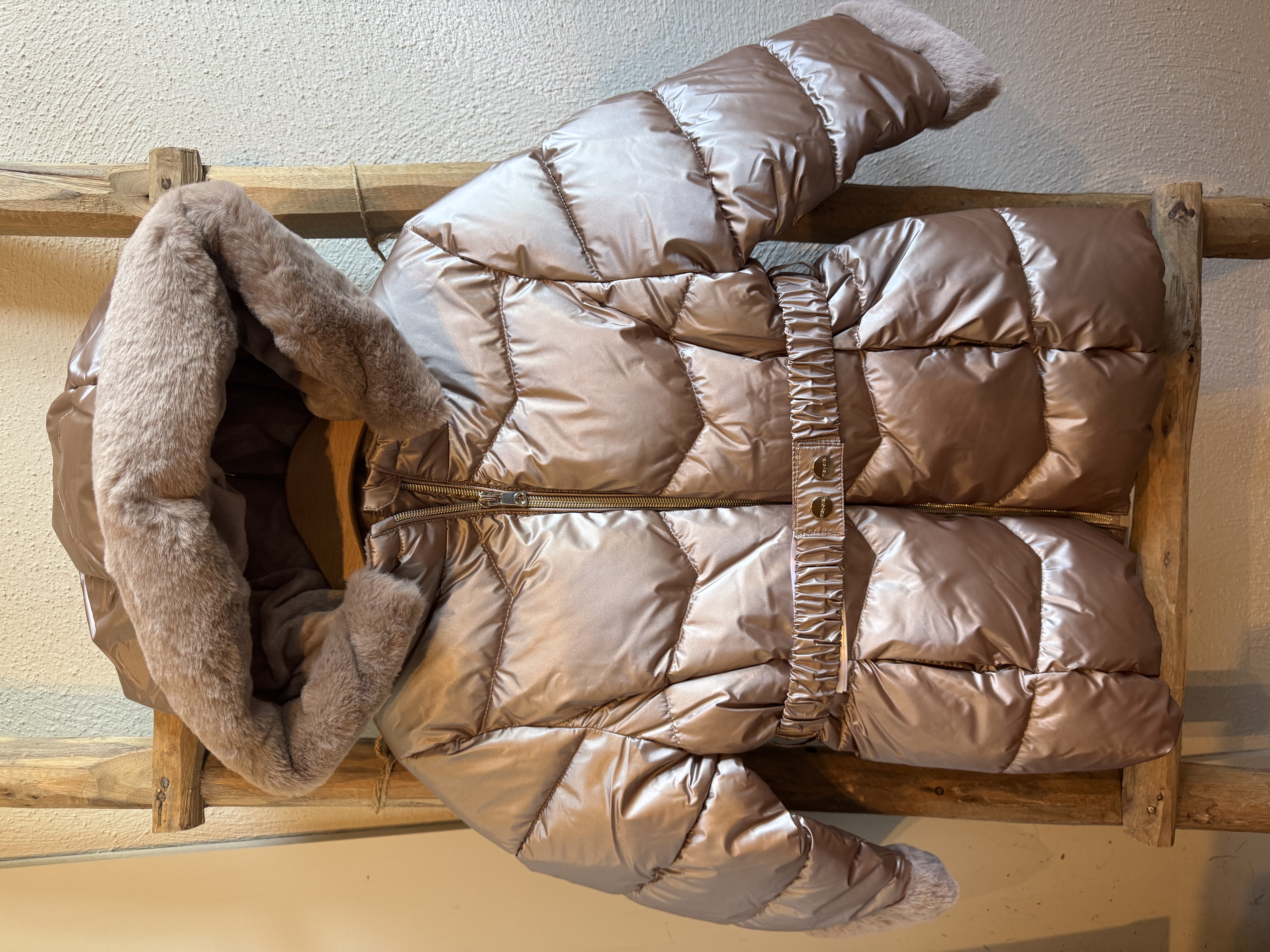 Prachtige winterjas van Mayoral in het taupe.