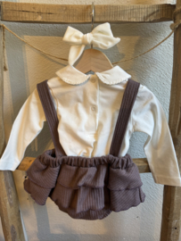 Prachtig jurkje /salopette van klein baby in de kleur Mauve.