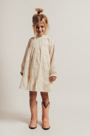 Mooie broderie jurk van Baje in het creme.