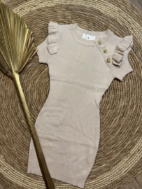 Fijne gebreide jurkjes met mooie goudkleurige knopen in het zandkleur .