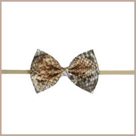 Prachtige haarband met leren strik met snake print.