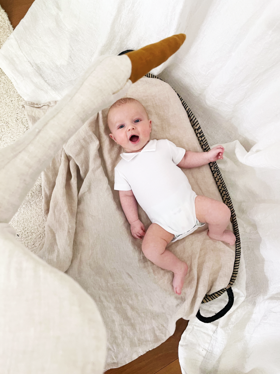 Polokraag romper met korte mouw van Klein baby in het offwhite.