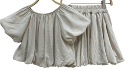 Mooi 2-delig setje in het zandkleur.