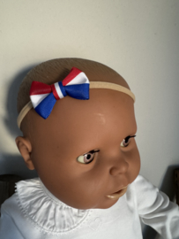 Koningsdag haarband met een kleine strik.