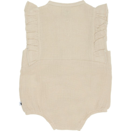Body van mousseline van klein babykleding in het zandkleur.