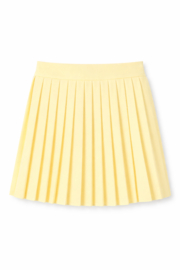 Zacht geel plooirokje met een mooie boord.