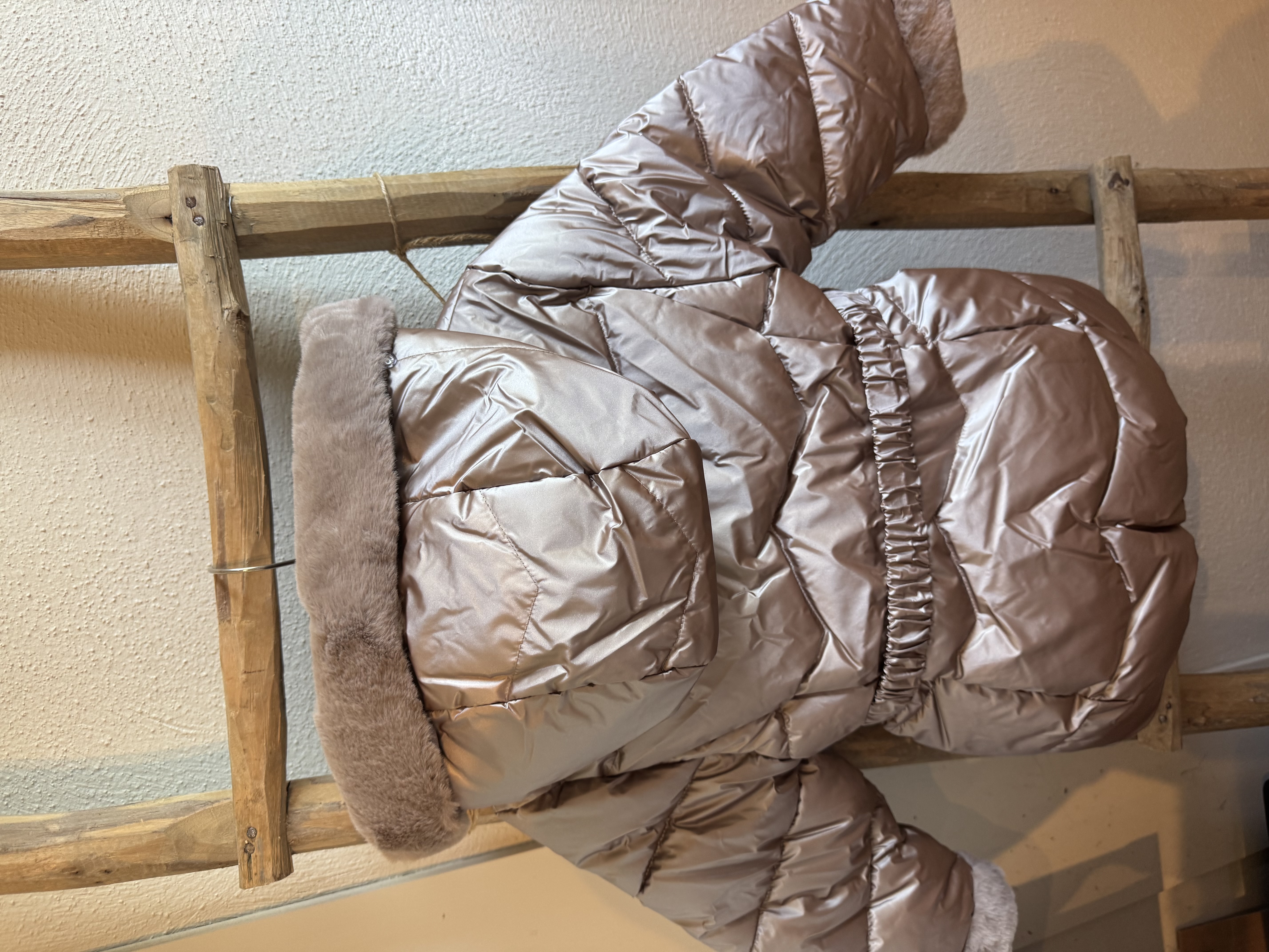 Prachtige winterjas van Mayoral in het taupe.