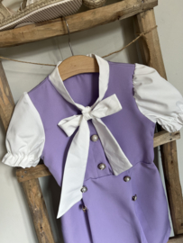 Chique jurkje met strik in lila/offwhite.