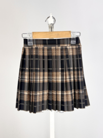 Geruit rokje in het zwart met bruintinten.