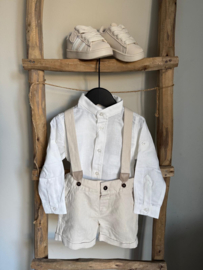 Mooie uitgewerkte kiel blouse van Dr kid in het wit met lange en korte mouw.