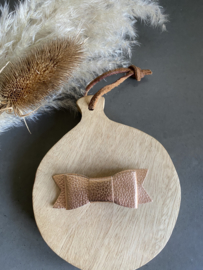 Prachtige leren rosé goudkleurige haarstrik .