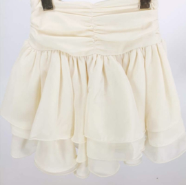 Mooi uitgewerkt rokje in het beige .