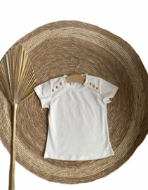 Prachtig shirtje met elastan en gouden knoopjes.