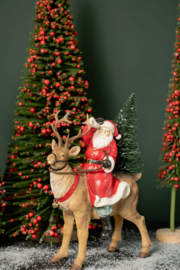 Kerstman op rendier met LED