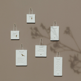 Räder poetry tile "There is no place like home"