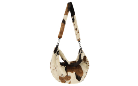 Tarvisio schoudertas met koeienprint – zacht en trendy