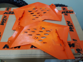 KTM SX 65 SET ORANJE RADIATEURKAPPEN 2009 - 2015 GEBRUIKT