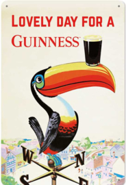 Lovely Day For A Guinness Toekan . Metalen wandbord in reliëf 20 x 30 cm.