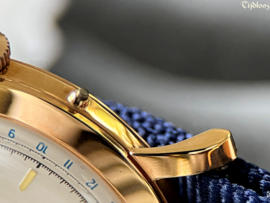 Olma Hamerautomaat Kalender 18k Goud Horloge
