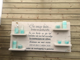 Wandbord steigerhout met tekst In onze tuin