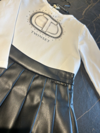 Zwart leren rokje met shirt