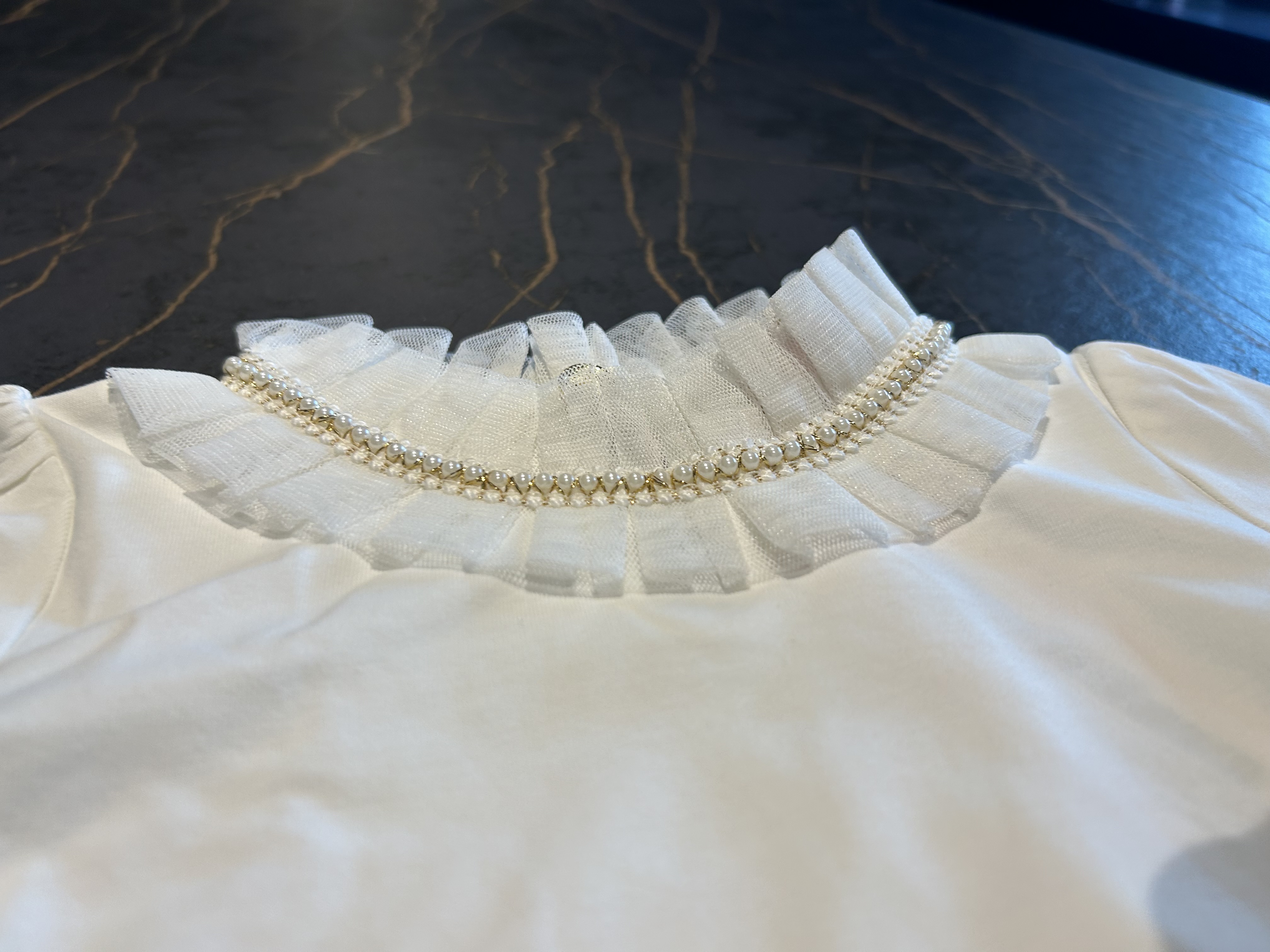 Witte set rokje en shirt met parels