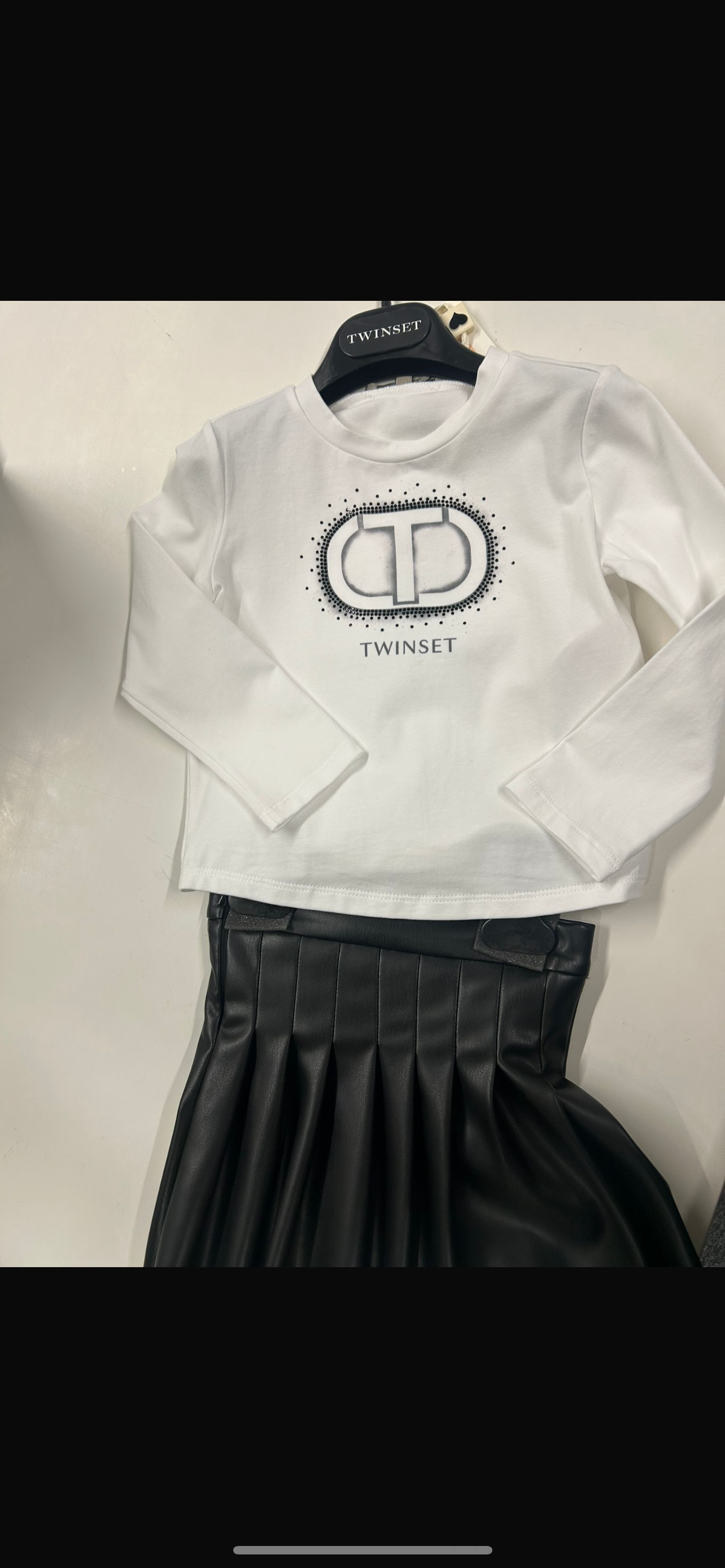 Zwart leren rokje met shirt