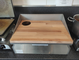 Stroopwafel cutting tray stainless steel with luxury wooden worktop