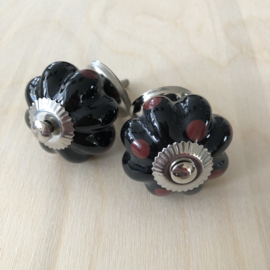 Knop zwart met rode stippen