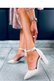 Women's suede pumps with a thick heel