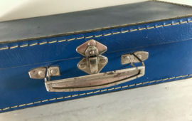 Vintage blauw koffertje van geperst karton
