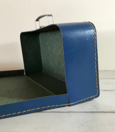 Vintage blauw koffertje van geperst karton