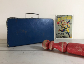 Vintage blauw koffertje van geperst karton