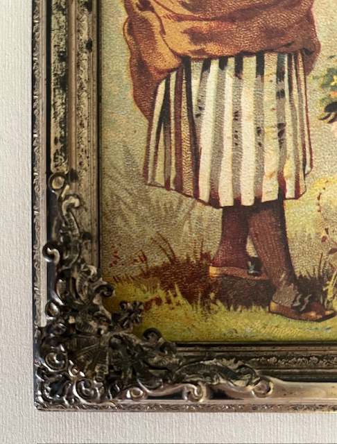 Vintage Frans metalen lijstje met nostalgische afbeelding