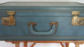 Vintage blauwe koffer