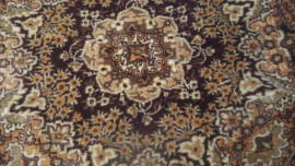Rond vloerkleed met kwastjes