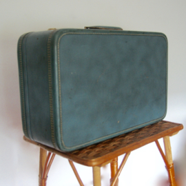 Vintage blauwe koffer