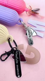 Lippenbalsemhouder met bedels