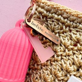 Lippenbalsemhouder met bedels