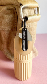 Lippenbalsemhouder met bedels