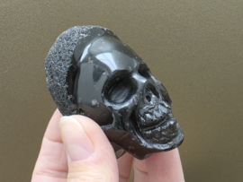 Cintamani human skull