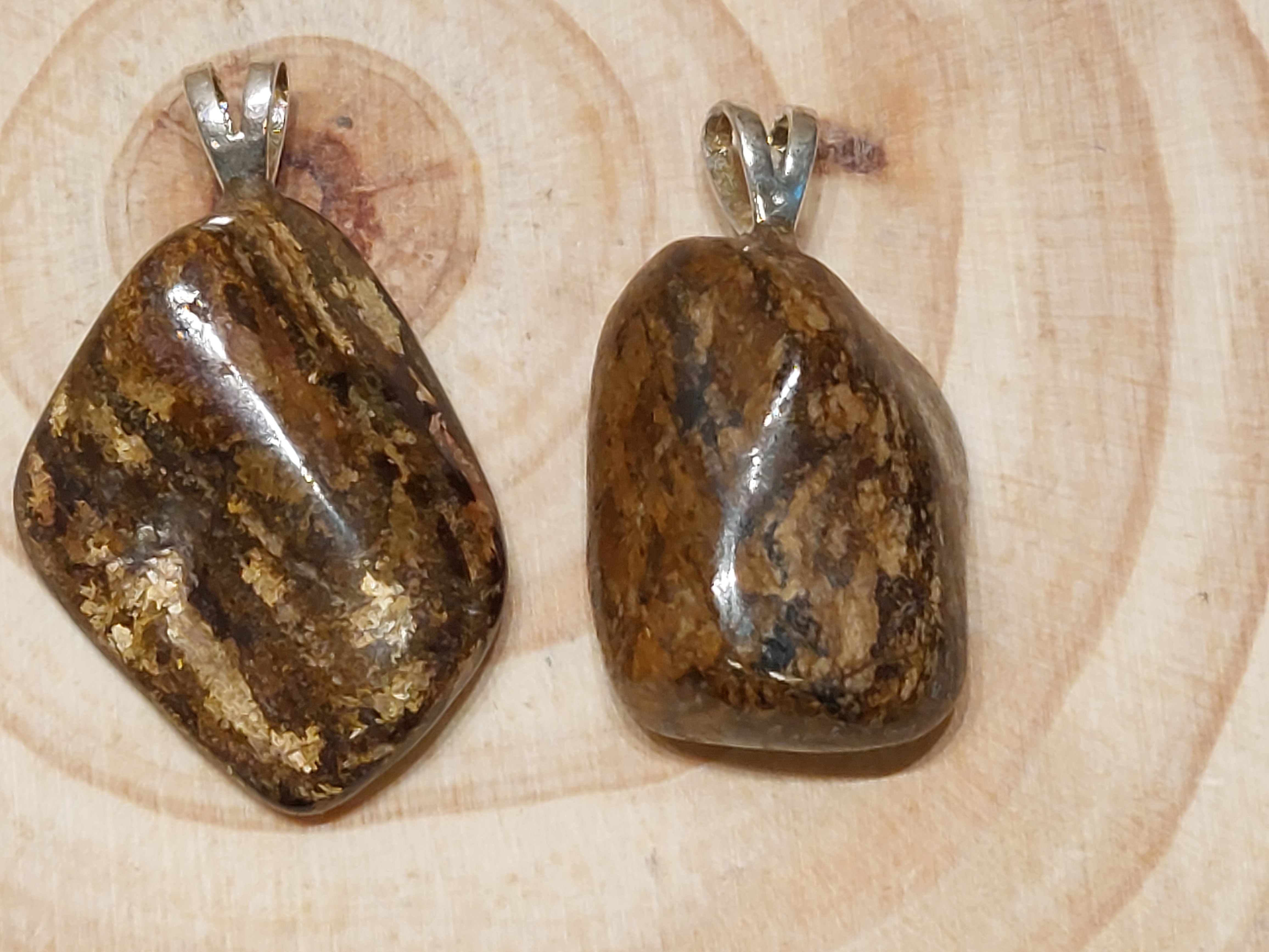 Bronziet hanger met zilveren oogje