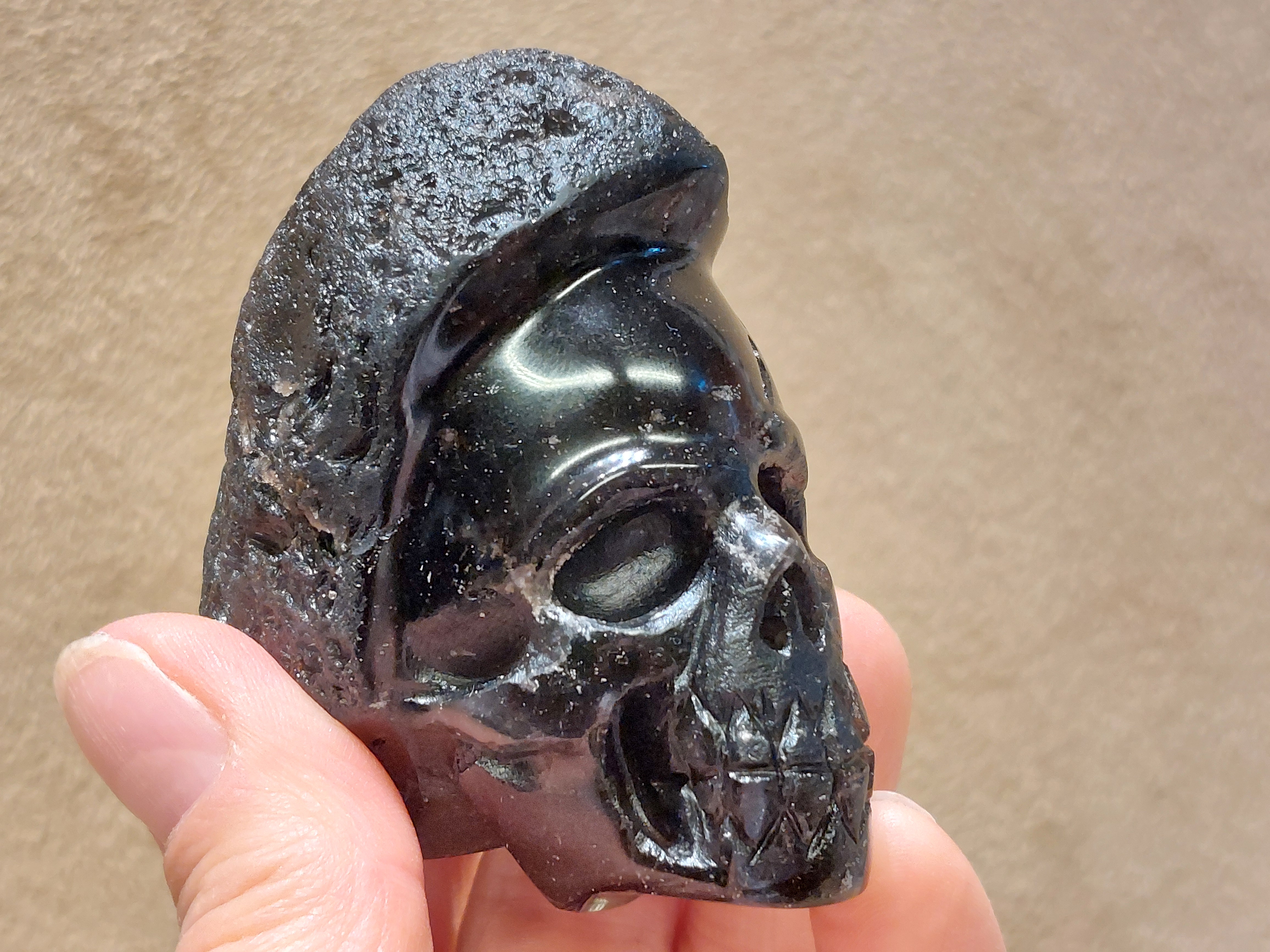 Cintamani human skull