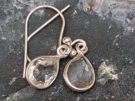 Bergkristal oorbellen in zilver facet geslepen