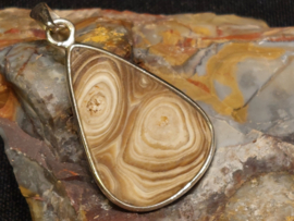 Chocolade calciet/aragoniet hanger in zilver