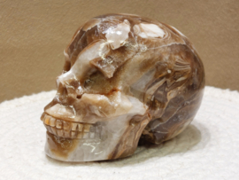 Chocolade calciet/aragoniet human skull
