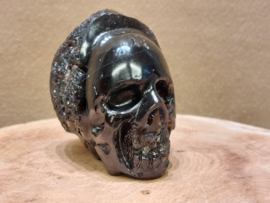 Cintamani human skull