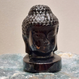 Zwarte obsidiaan boeddha hoofd