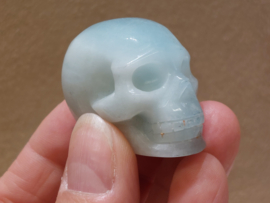 Aquamarijn human skull